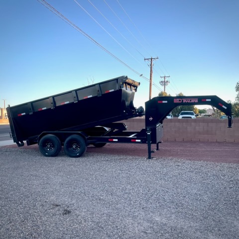 Black roll-off dumpster trailer with tilting mechanism