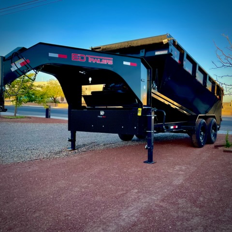 Roll-off dumpster in open position showing hydraulic system